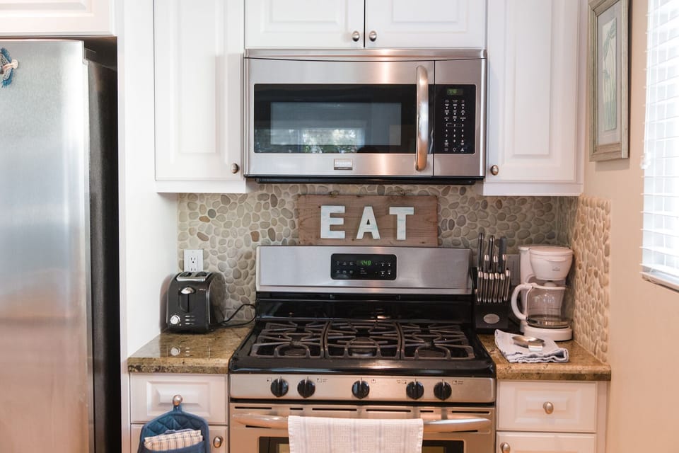 Stainless steel appliances and all the kitchen utensils you'll need for any meal