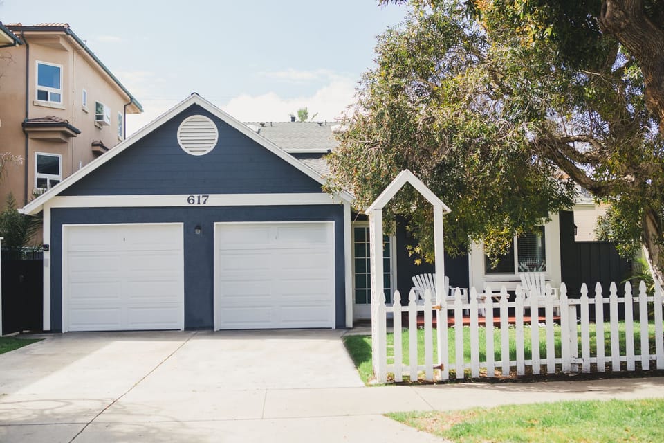 View from street.  1 Car garage and space in driveway