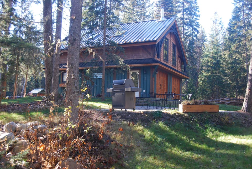 east side of carriage house with patio and barbecue