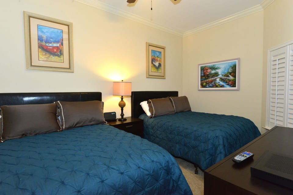 Third Bedroom with Two Full Beds, 40' Smart TV, and Private Full Bath