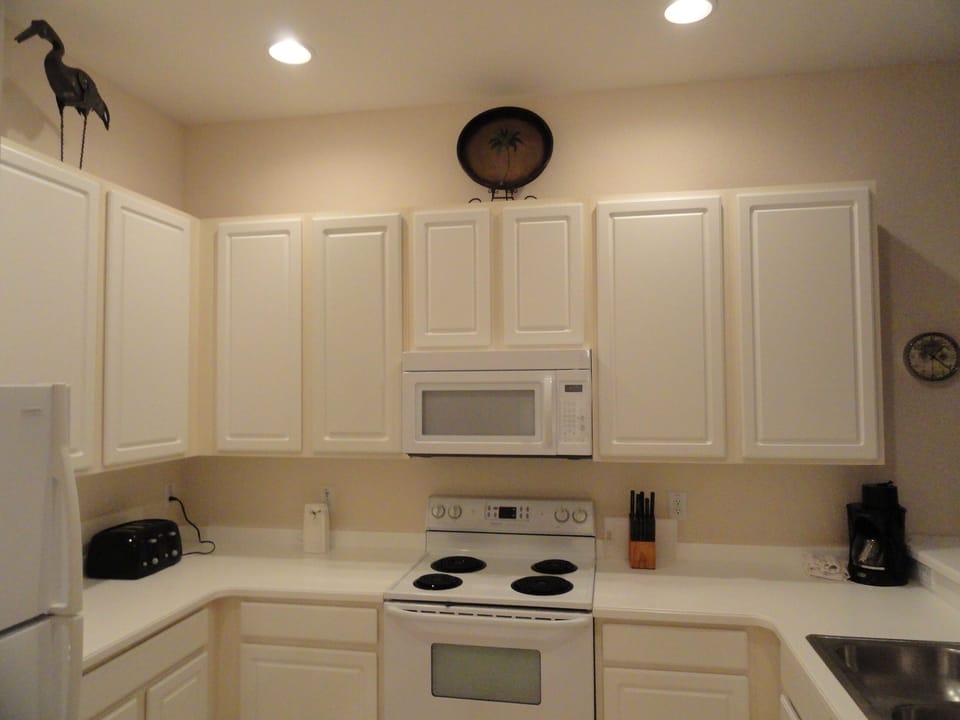 Fully Equipped Kitchen w/ Dishwasher, fully stocked with dishes, pots, utensils,
