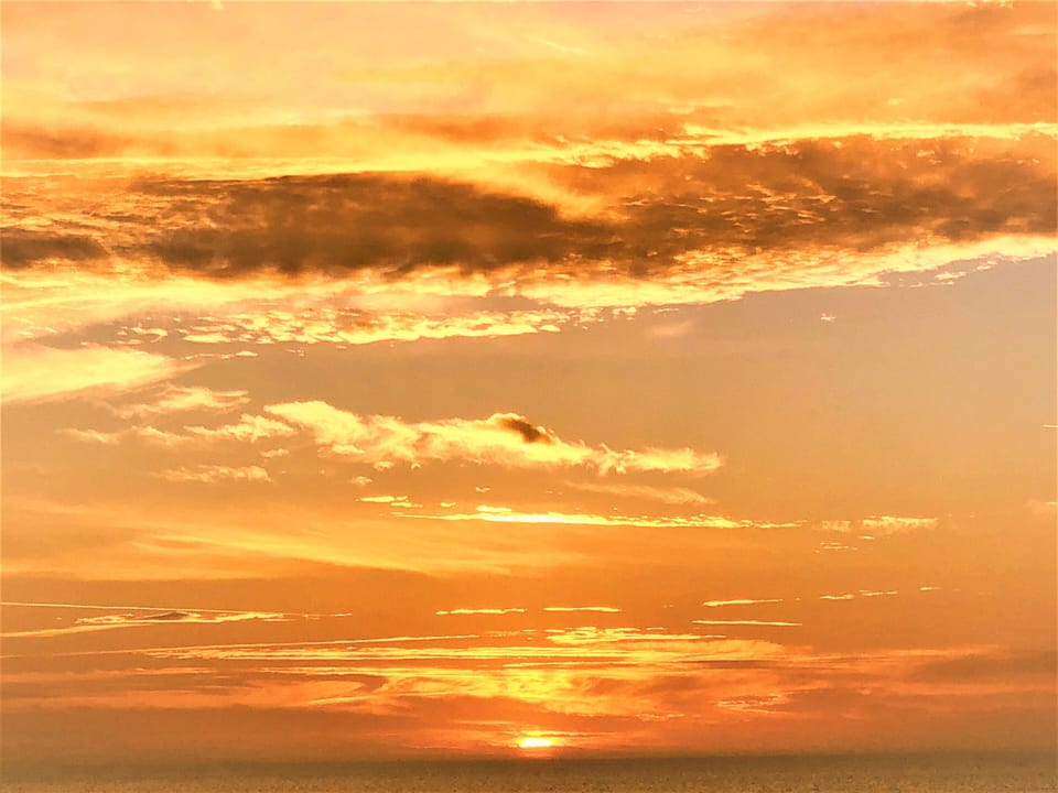 Typical spectacular sunsets - hence the name "Sunset Beach"(view from balcony)
