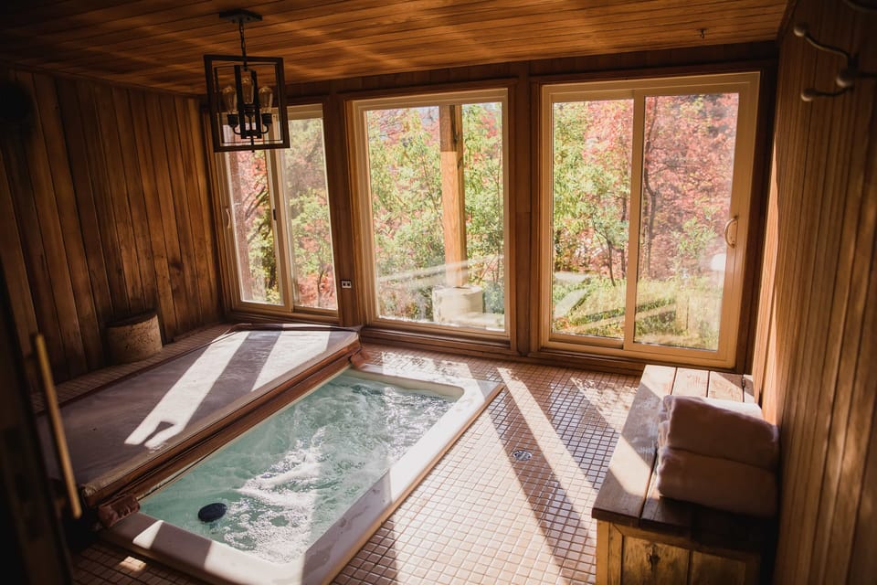Beautiful views from the hot tub room. Windows open to enjoy nature outside!