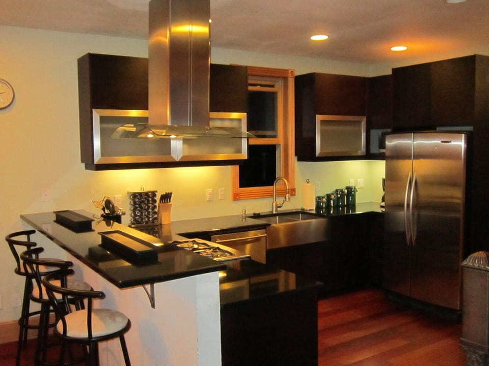 Gourmet Kitchen adorn with high-end stainless appliances