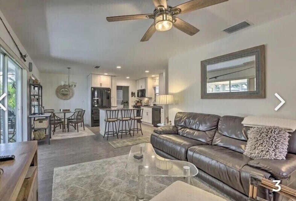 Open concept kitchen dining and living room