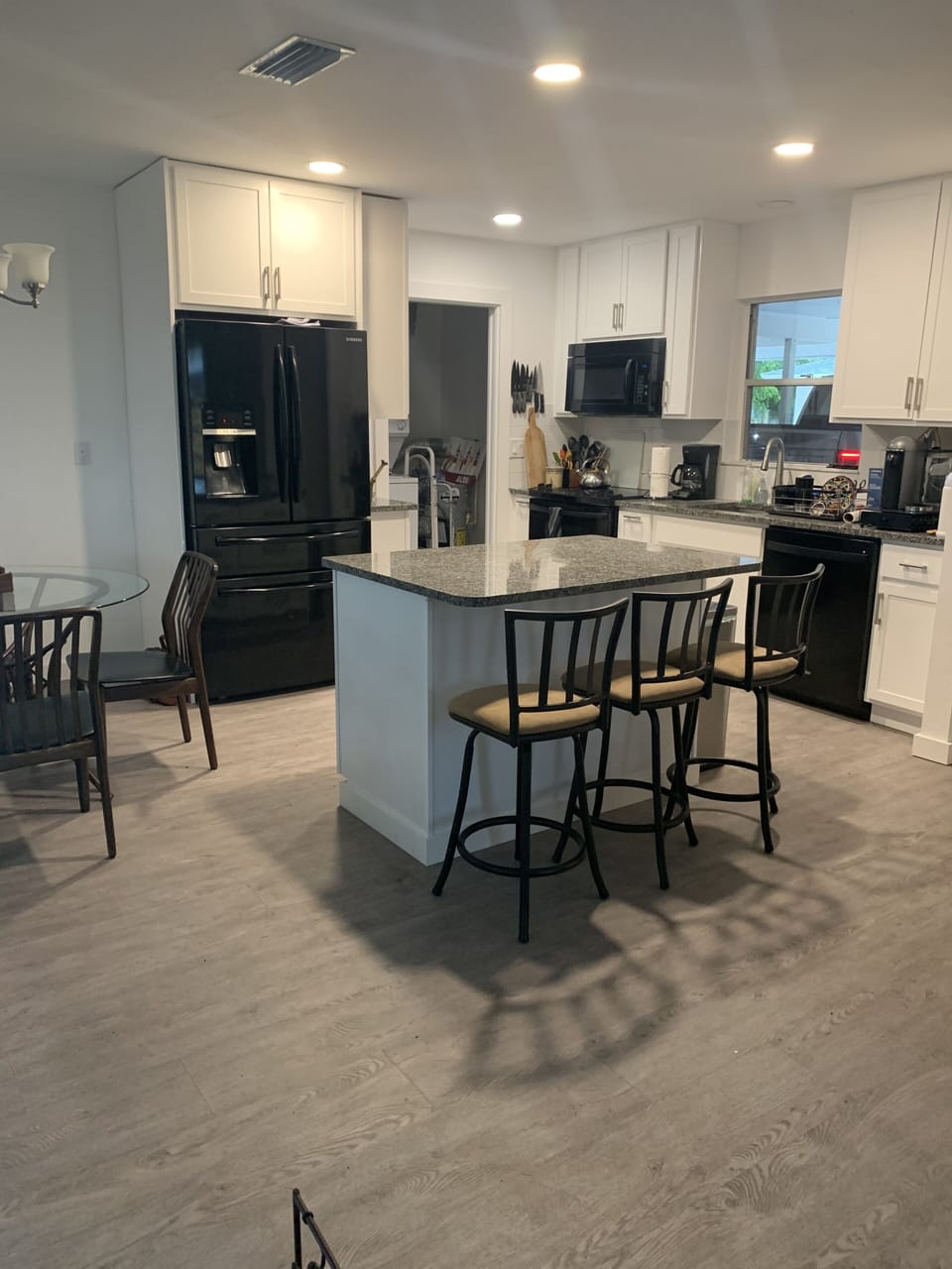 Great open concept kitchen! New appliances D/W, side by side frig,granite island