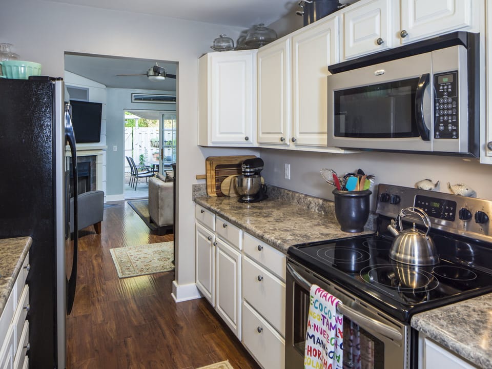 Kitchen view looking into living room.