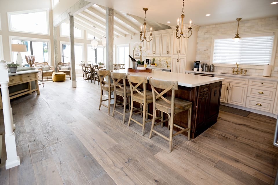 The great room w/ custom kitchen, massive island & professional Viking Range.  