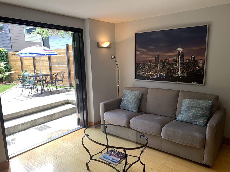 French door open to a private back yard