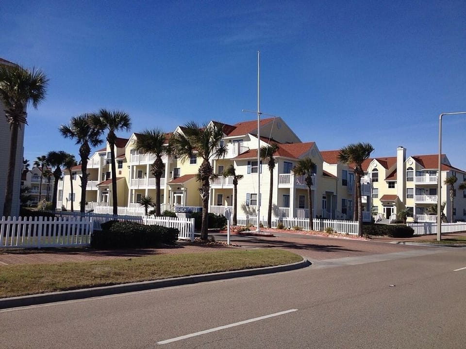 Main entrance of Beach Club off of Whitecap Blvd.