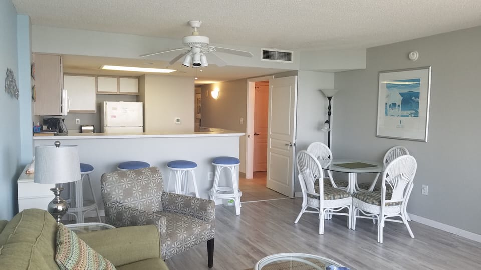 Living room and dinning for 8 people  (barstools and dinning table)