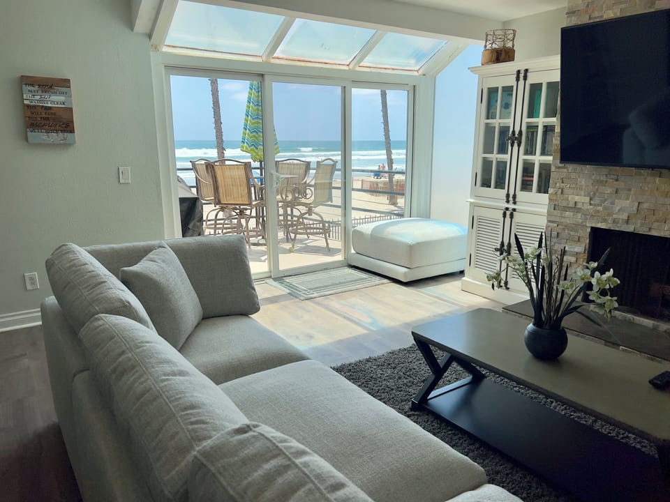 Enjoy that ocean view from the comfort of our plush sofa! 