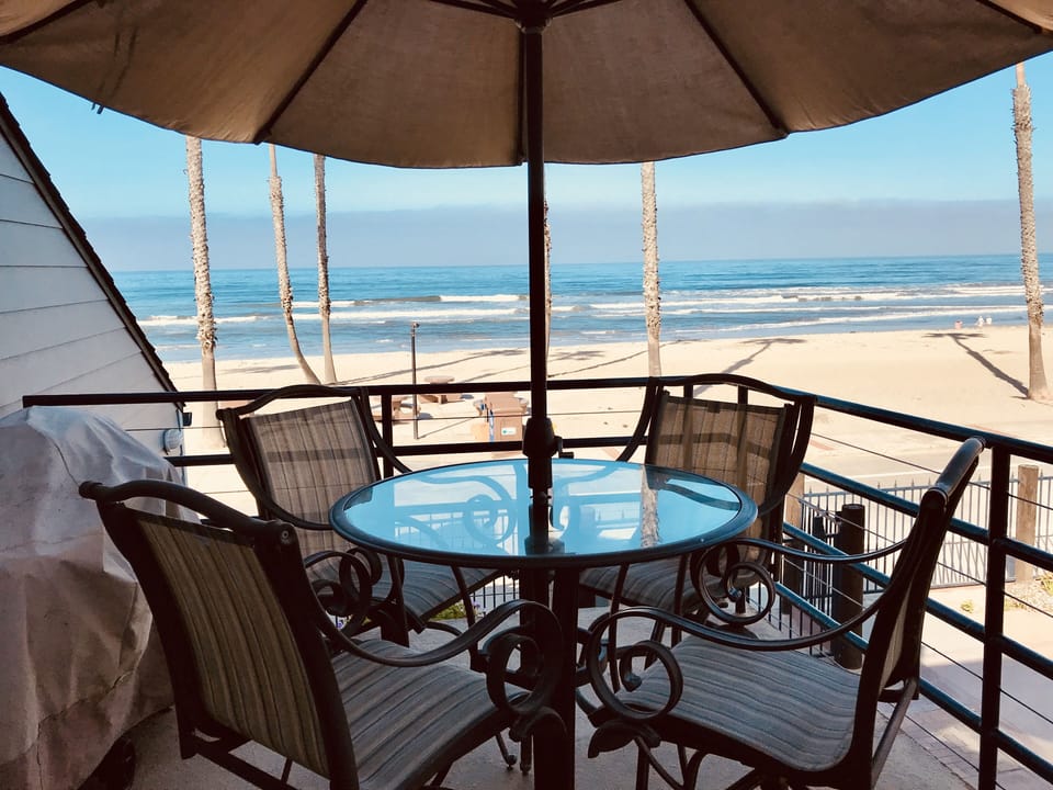 Seating for four and a gas grill on our private balcony. Best view in town! 