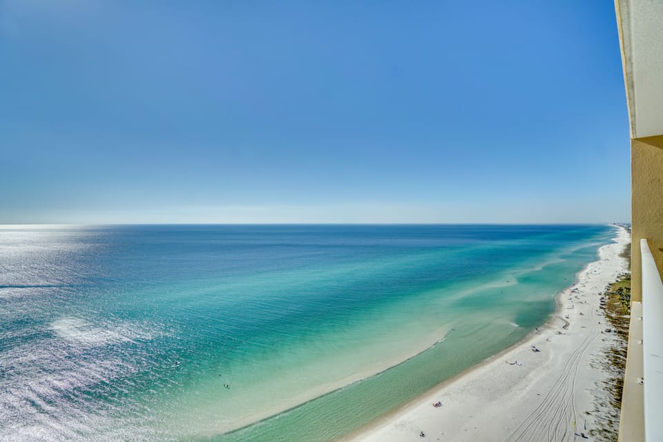 West view off your balcony....white sand and blue water.