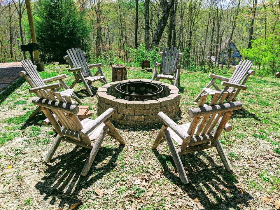 Stone firepit with insert.  Evening camp fire is where memories are built.  