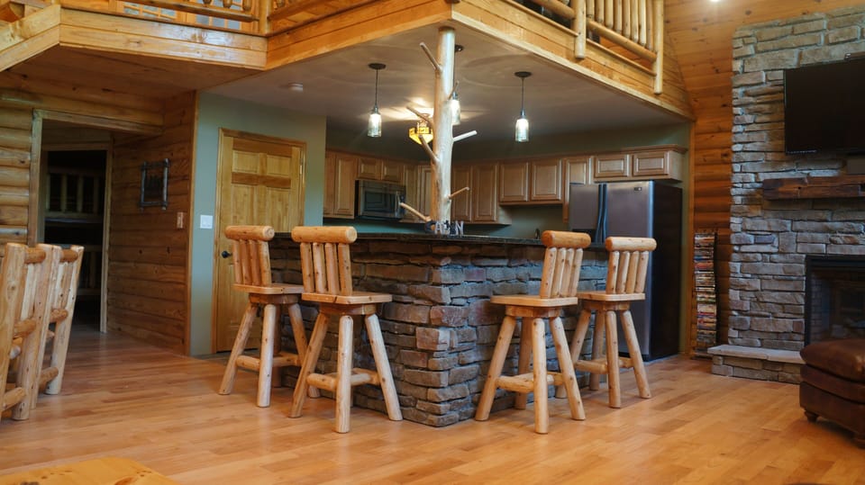 Comfortably fits up to 10 people. $50k in custom log furniture for your pleasure