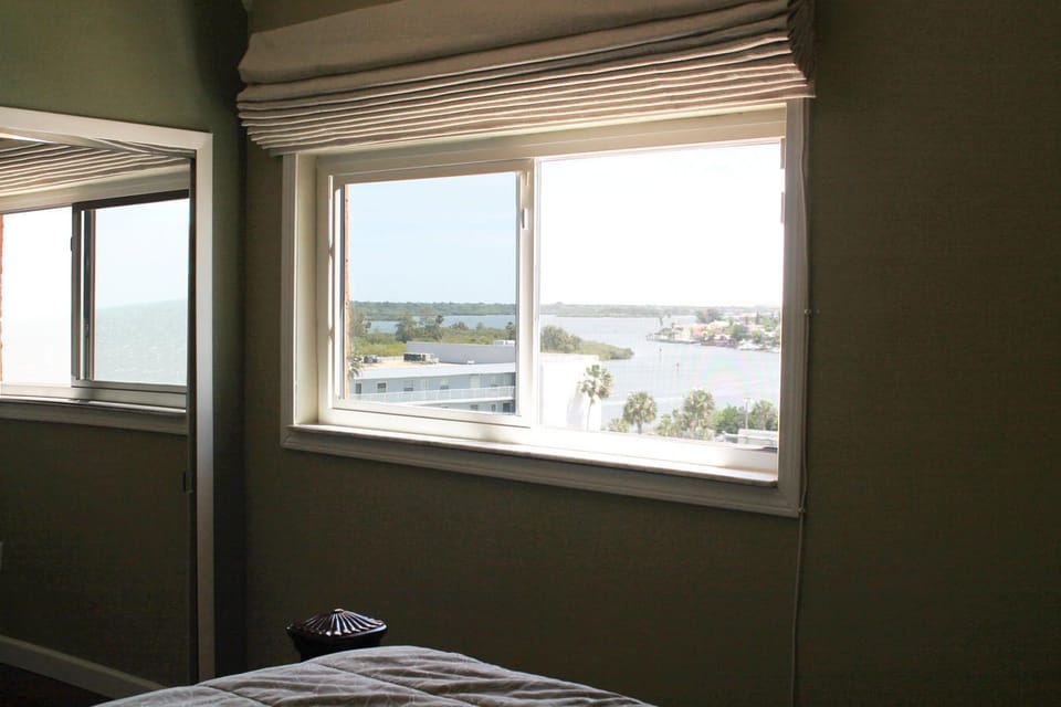 Guest Room Automatic shades controlled right from your bed