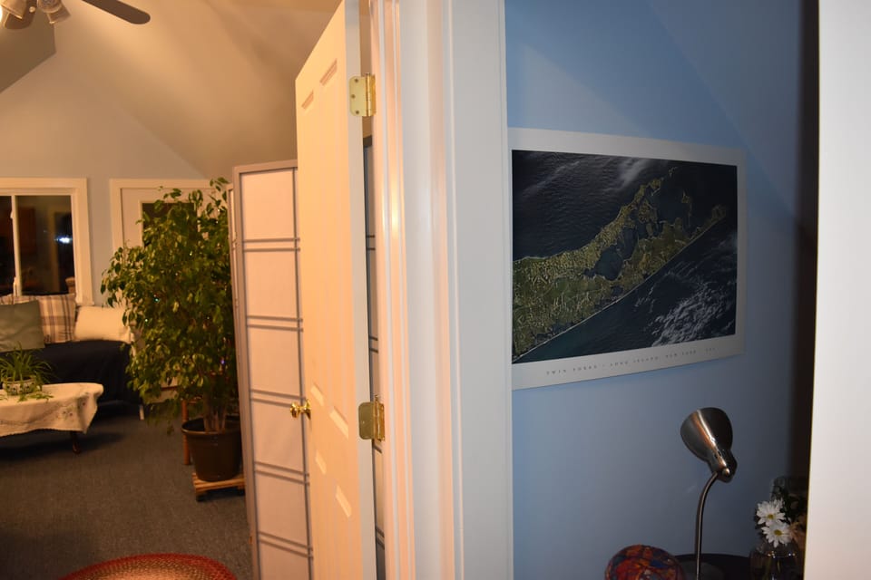 This is the view from the hallway looking towards the little bedroom and main rm