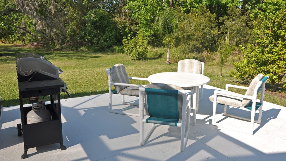 The BBQ area of the pool deck includes plenty of space for entertaining.