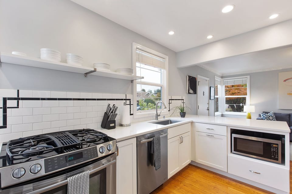 Open concept kitchen with breakfast bar.