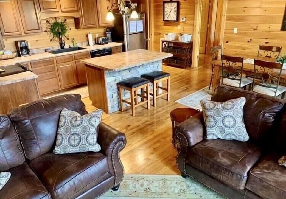 Kitchen fully stocked with coffee makers and cooking utensils