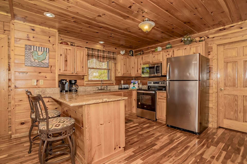 Well stocked kitchen, stainless steel appliances.