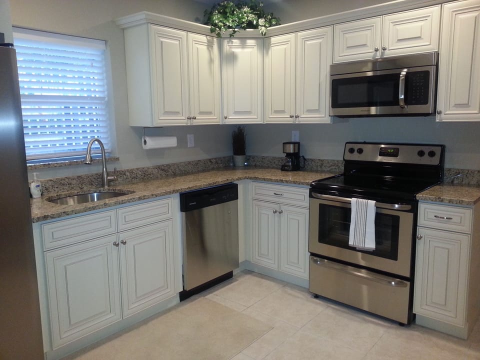 Full kitchen with Dishwasher, and almost everything you need to cook dinner.