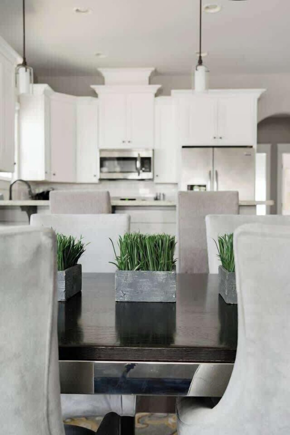 Imagine hosting intimate gatherings in this stunning kitchen!