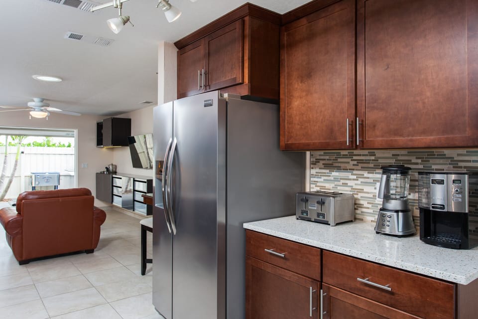 Fully Equipped Kitchen with Crushed Seashell & Concrete Countertops
