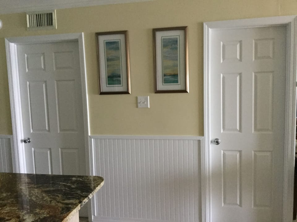 Freshly painted walls. New bead board between bedroom & guest bathroom