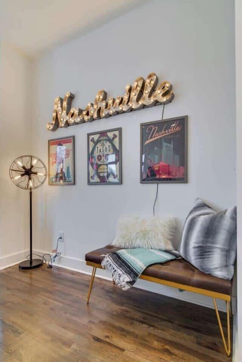 Illuminating 'Nashville' – a vibrant nod to the city's charm, complemented by curated art.