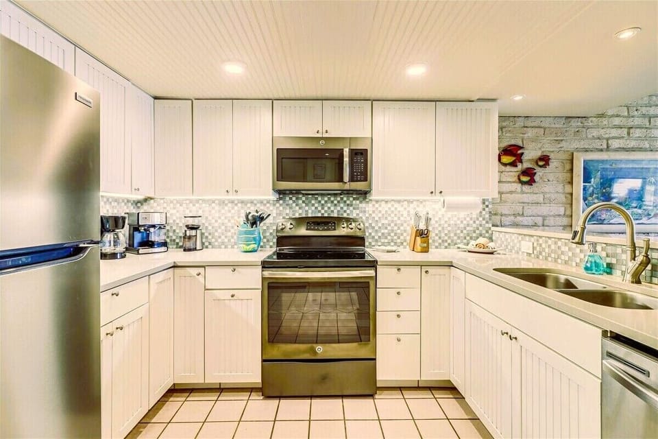Kitchen includes updated appliances and plenty of counter space for meal prep.