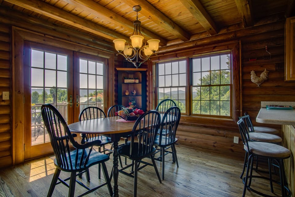 Dining Room looking out at the Deck and Mountain range