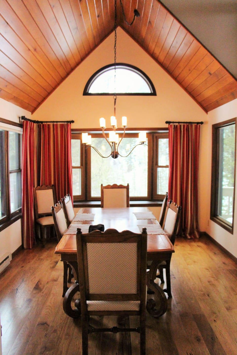 The Wood Cathedral Ceiling in the Dining Room Gives Charm to Every Meal