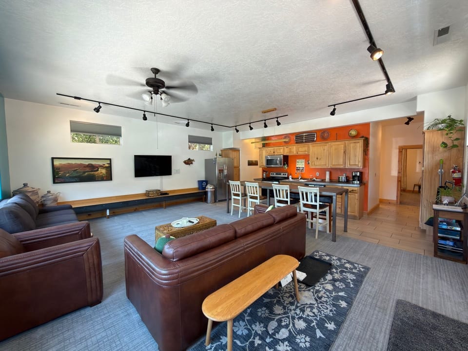 Very spacious open living area. Bench for taking off your shoes when you enter.