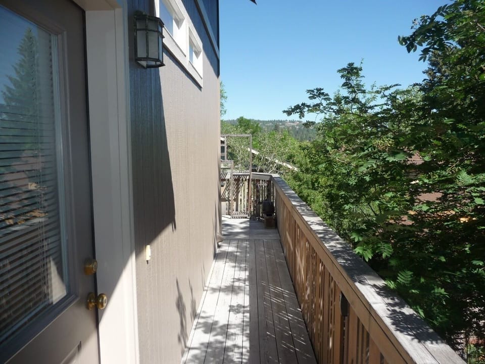 Top of the stairs at the entry.