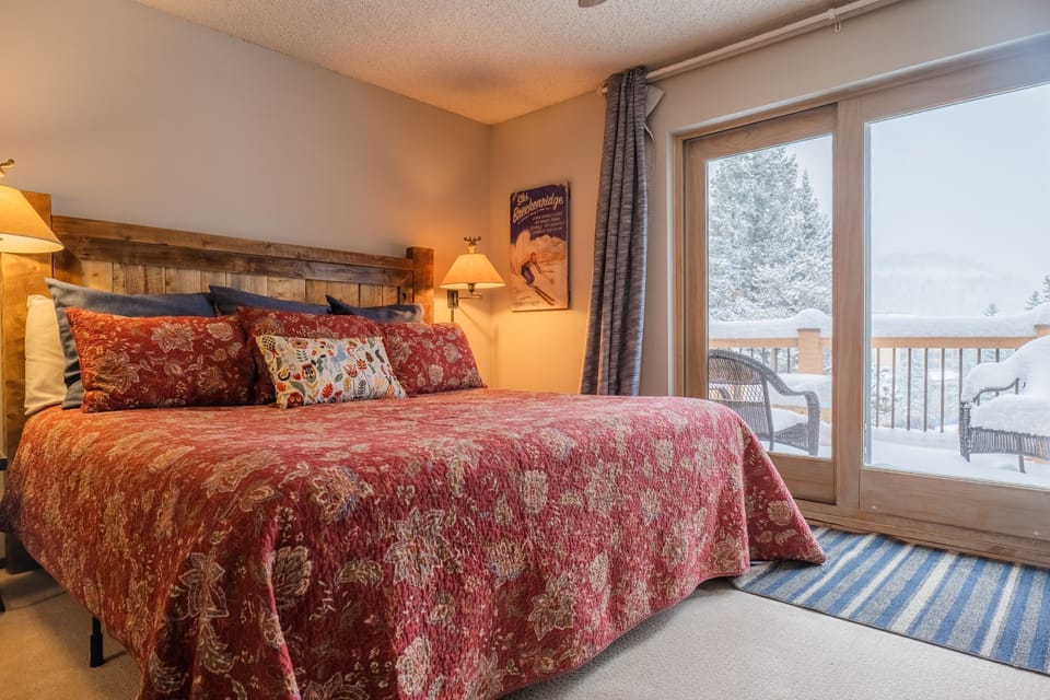Main bedroom with walk out balcony and en suite bathroom