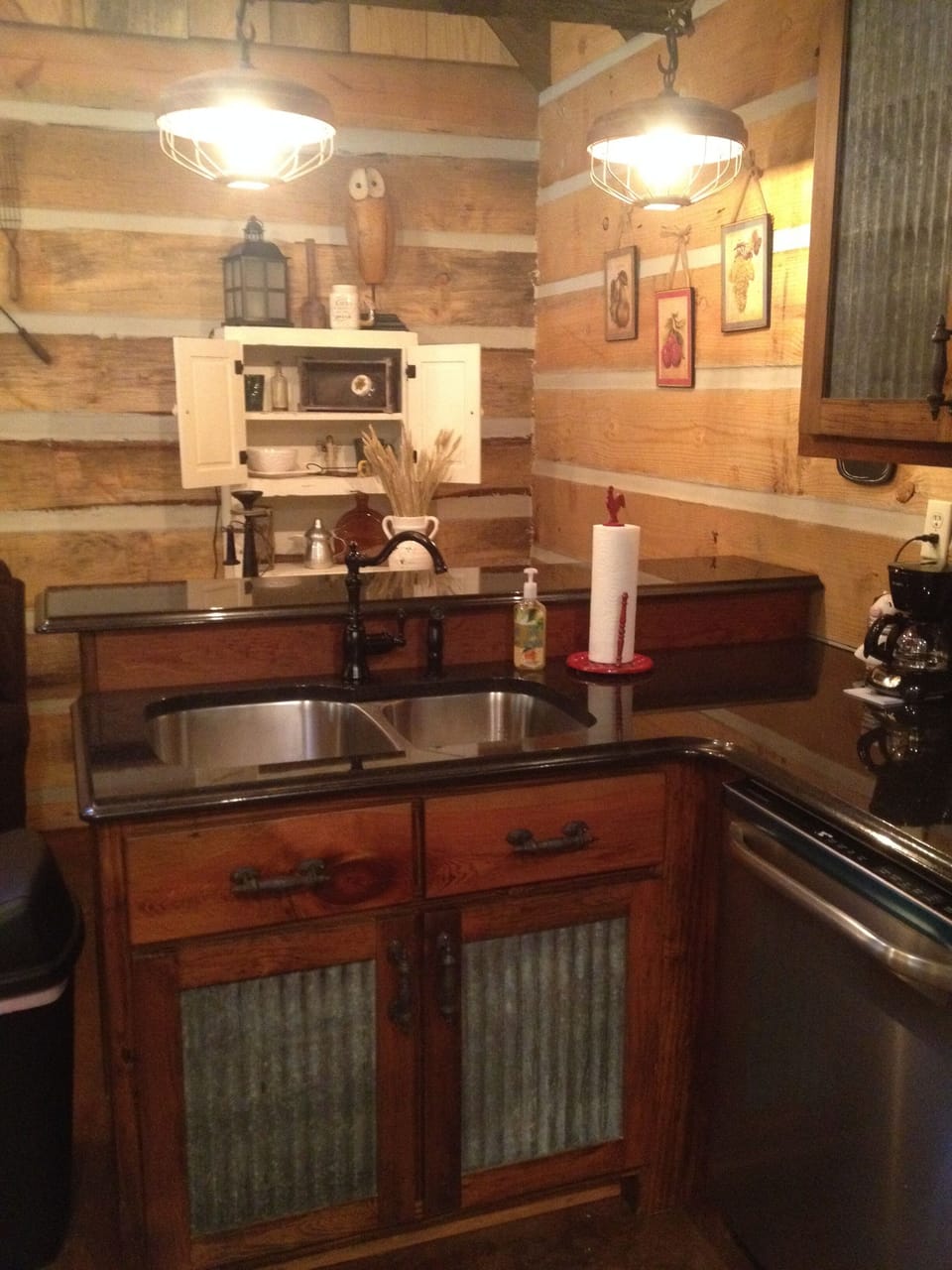 Antique chicken feeder lights, granite counters and custom cabinets
