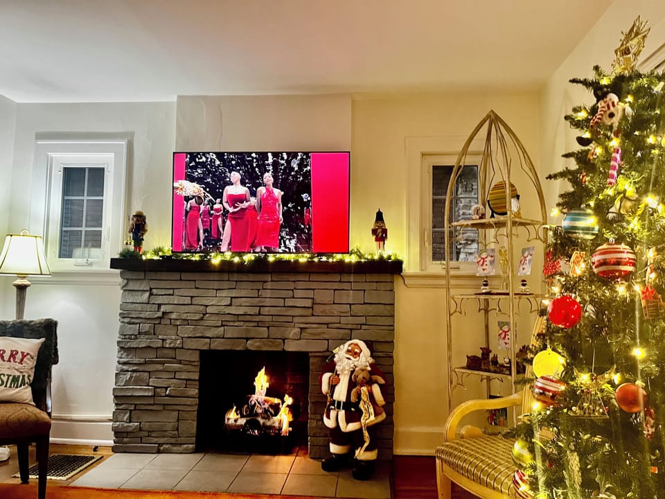 Cozy gas fireplace for chilly nights, decorated for XMAS in season.

