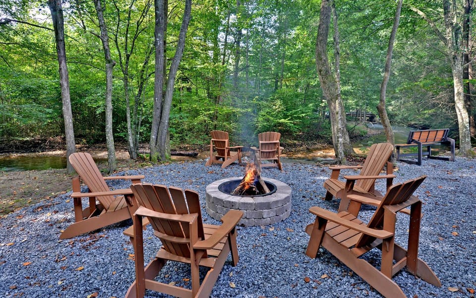 Enjoy a fire in the firepit creek side.