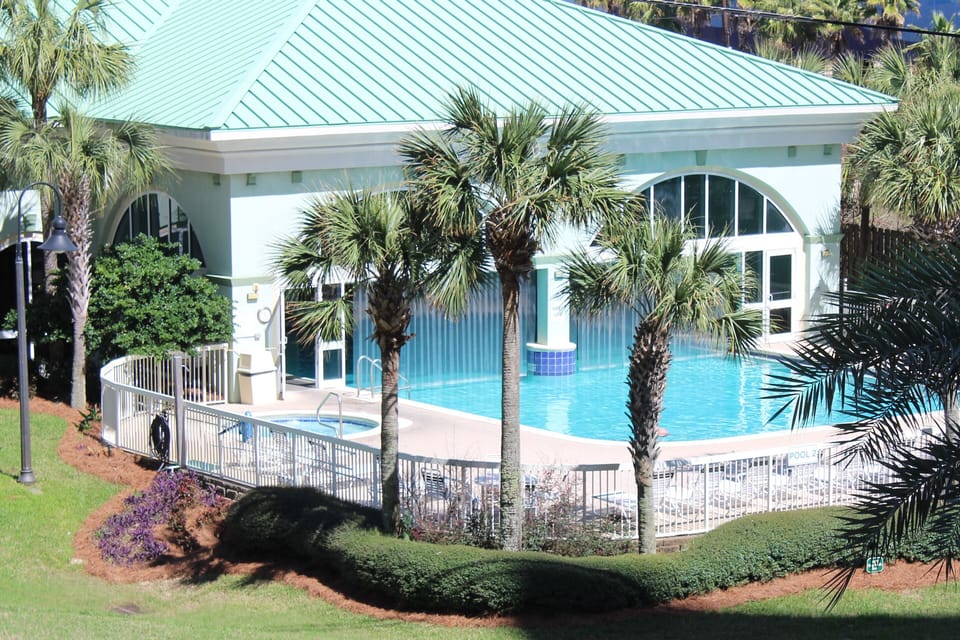 Indoor/outdoor heated pool with hot tub.