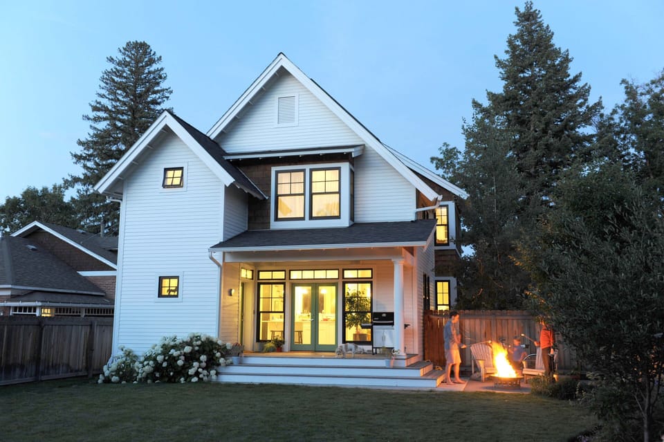  The backyard includes a patio with a fire pit.