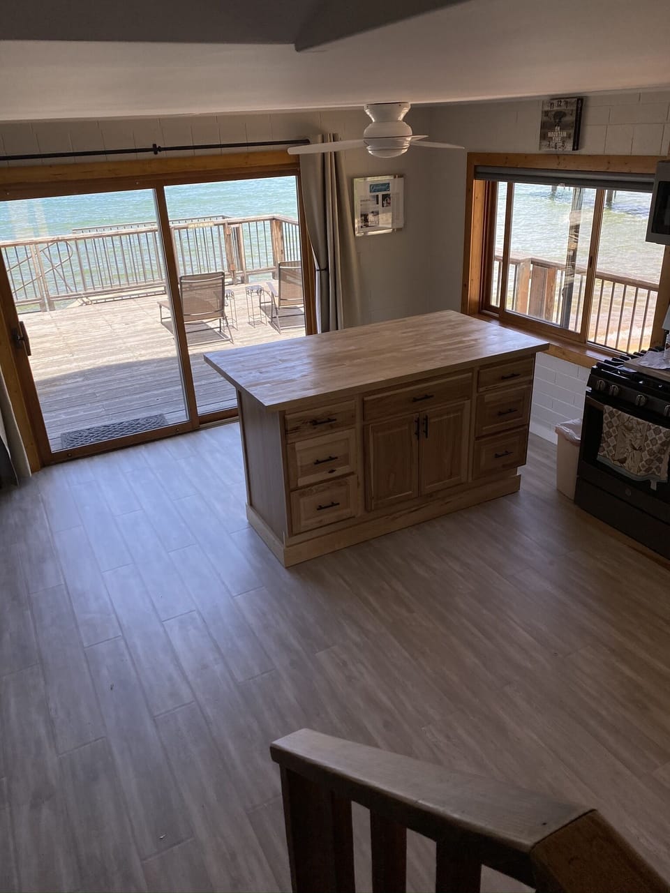 View looking down from stairs to kitchen