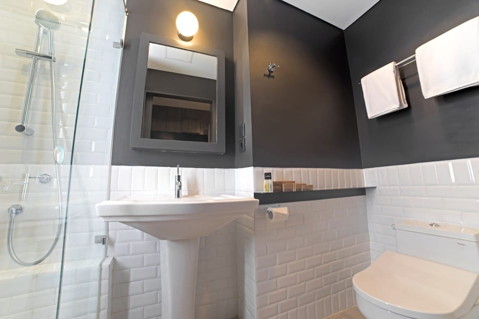 Shower, free toiletries, hair dryer, slippers