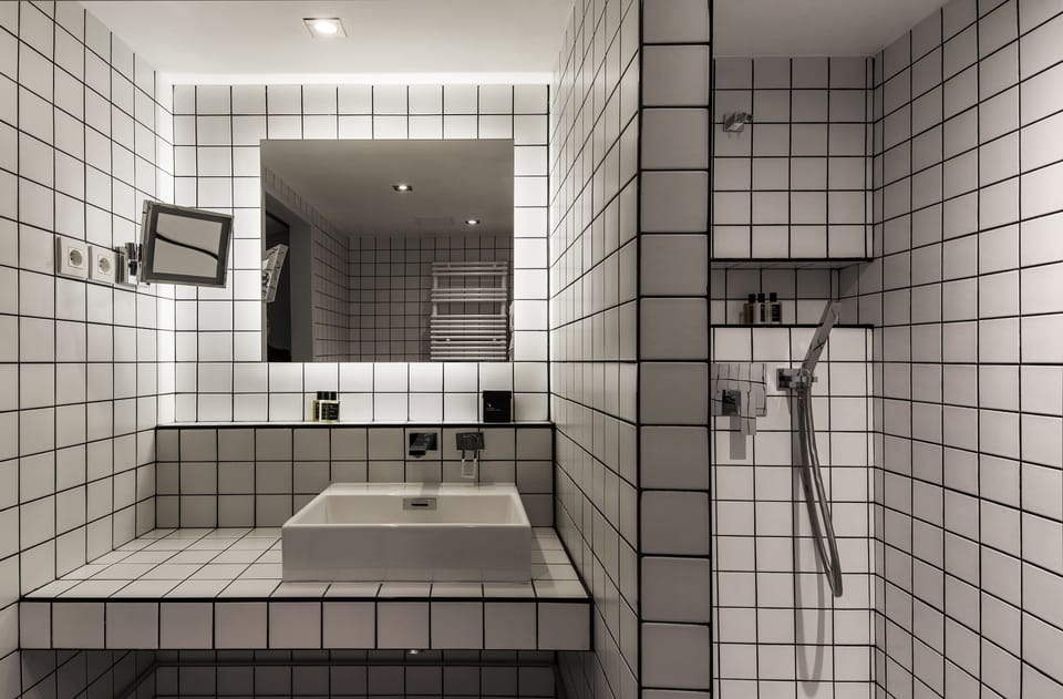 Combined shower/tub, free toiletries, hair dryer, bathrobes
