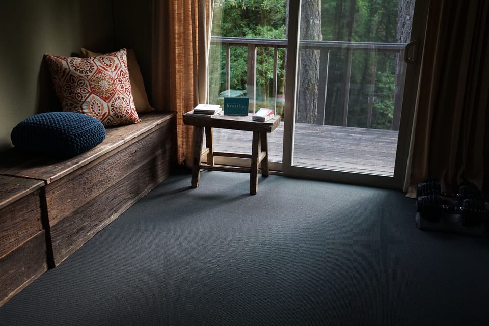 Yoga studio has gym & yoga equipment, plus space for an air mattress