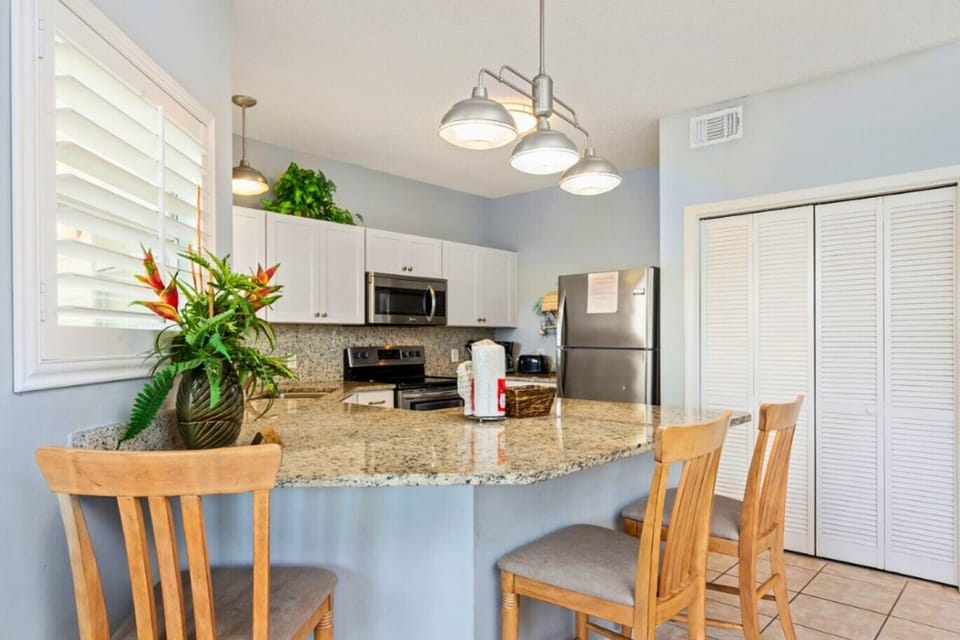Condo, 2 Bedrooms | Private kitchen | Full-size fridge, microwave, oven, stovetop