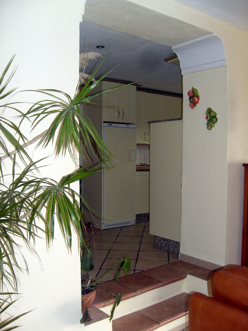 Family /dining room with entrance to kitchen and separate utility/pantry room.