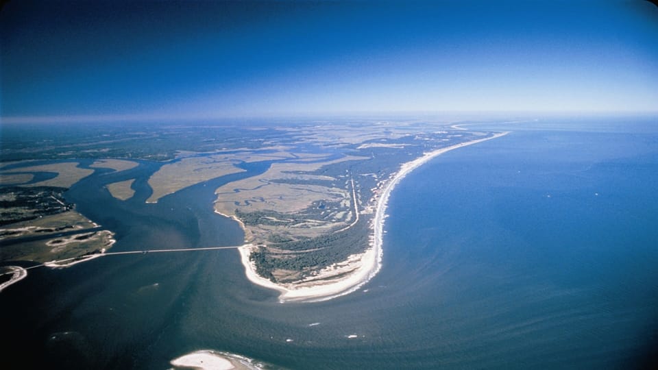 Aerial view of Amelia Island, an unspoiled barrier island surrounded by nature.