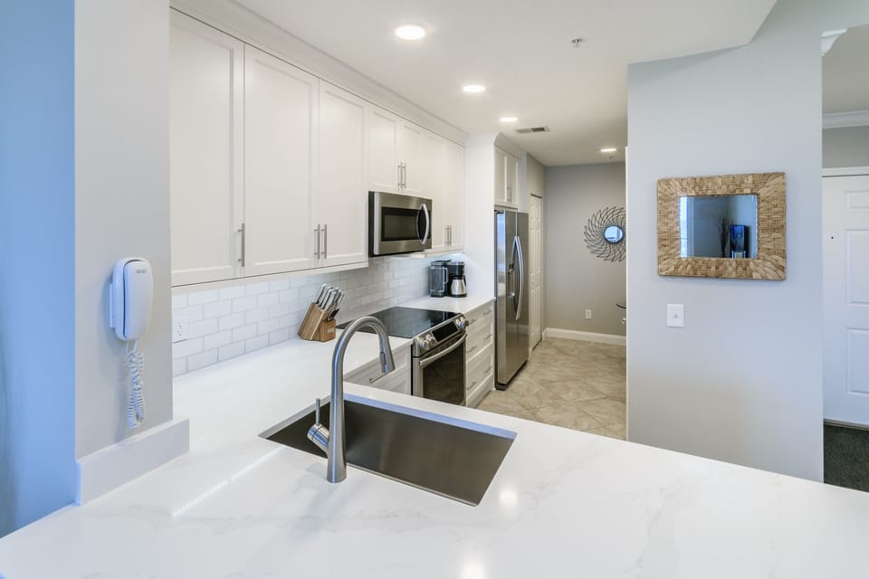 All new appliances, cabinets, quartz countertops, etc.